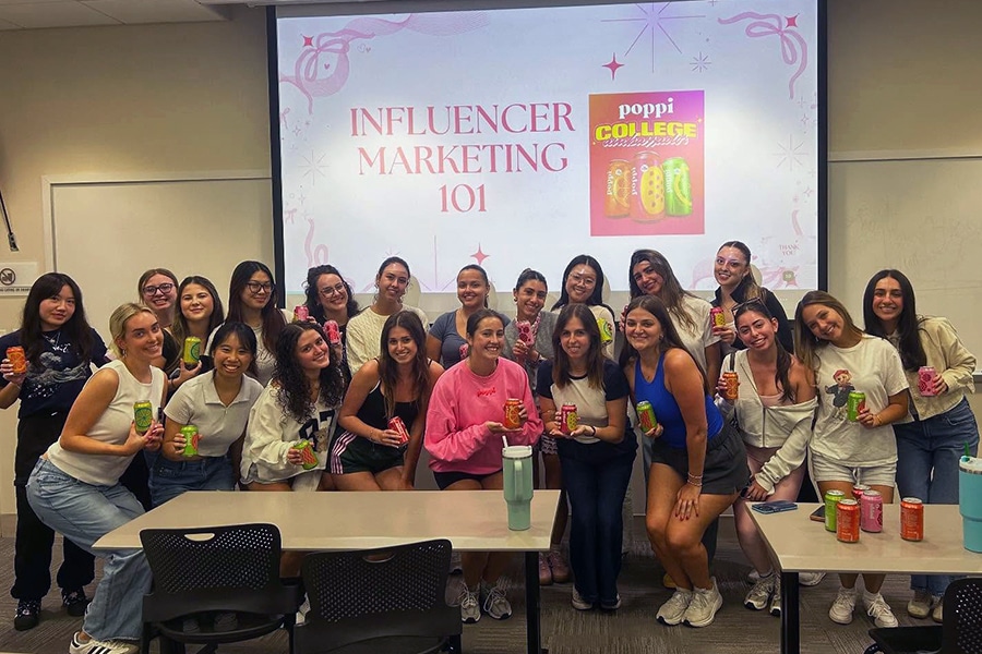 Retail Society students at a Poppi event. 