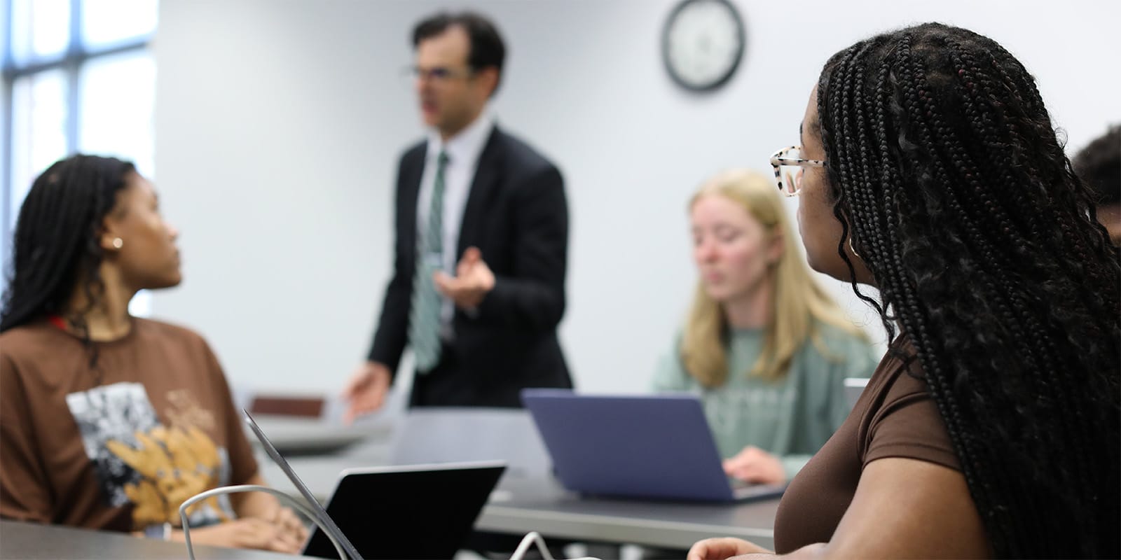 Students in class turned towards the professor.