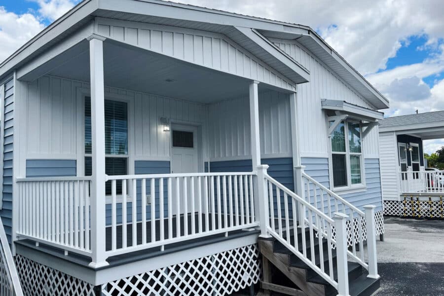 Model mobile home with a covered porch