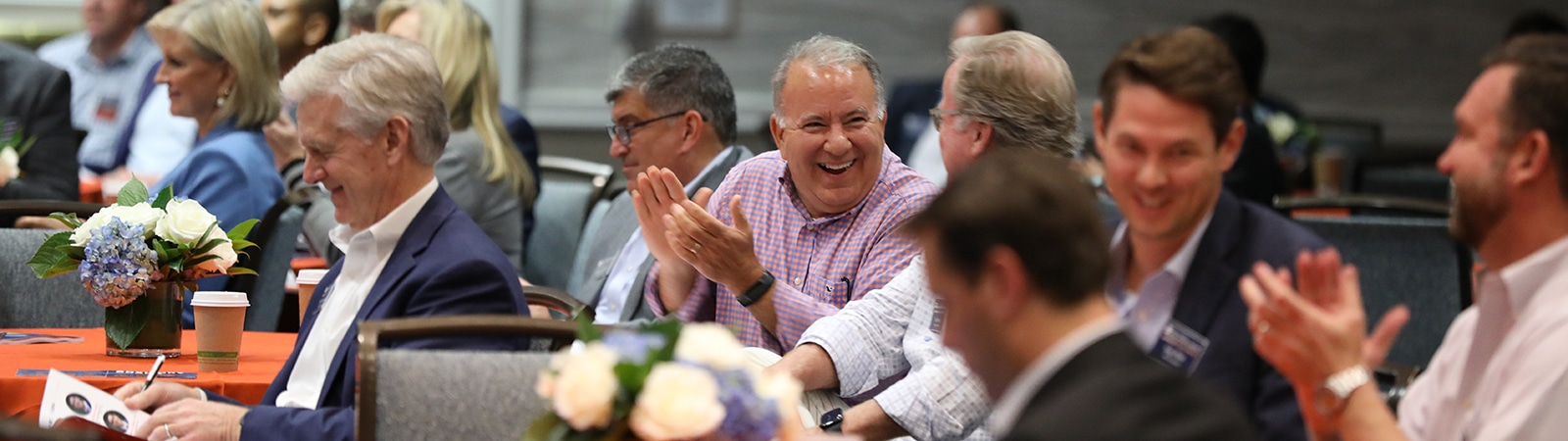 Smiling group at the Bergstrom Advisory Board Retreat event.