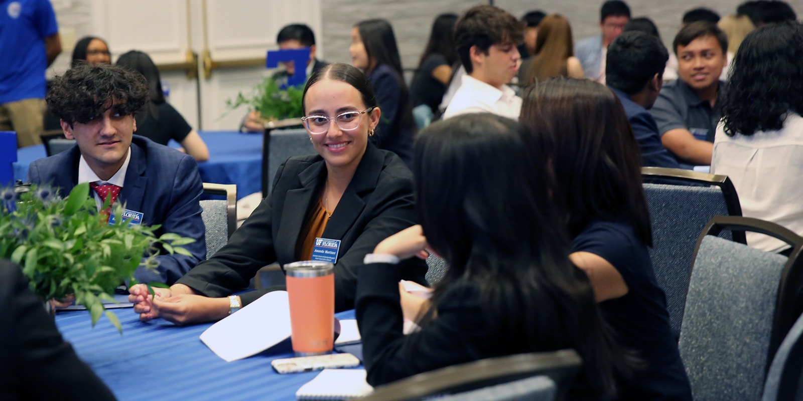 Smiling students at the MS-ISOM orientation event. 