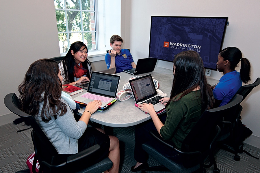 Students working together in a study room. 