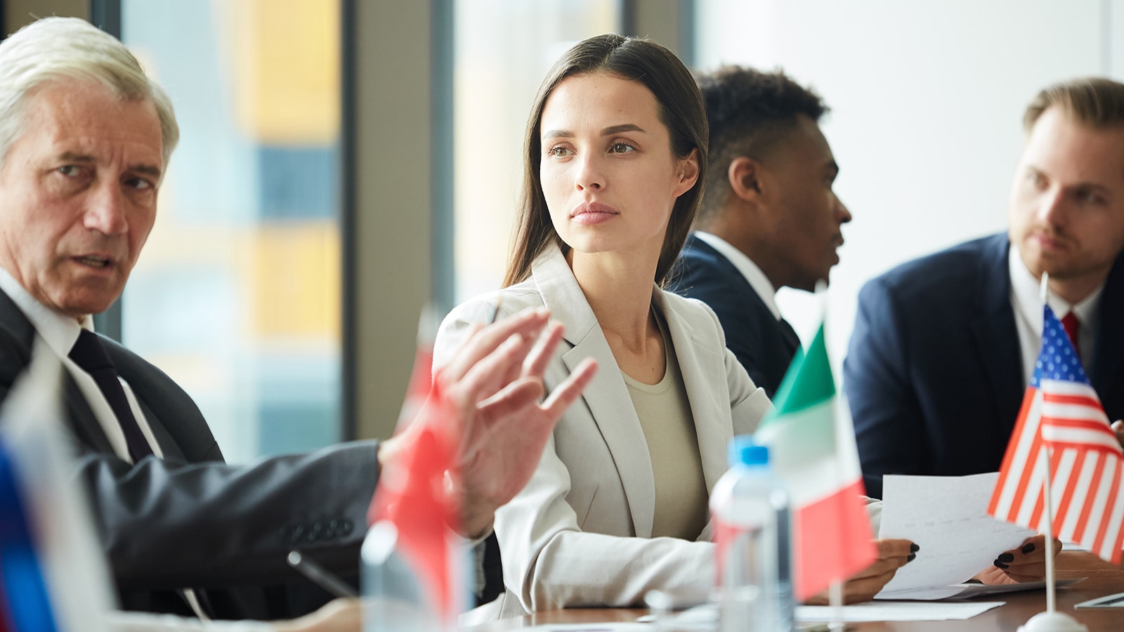 Student listening to a speaker at an international meeting. 