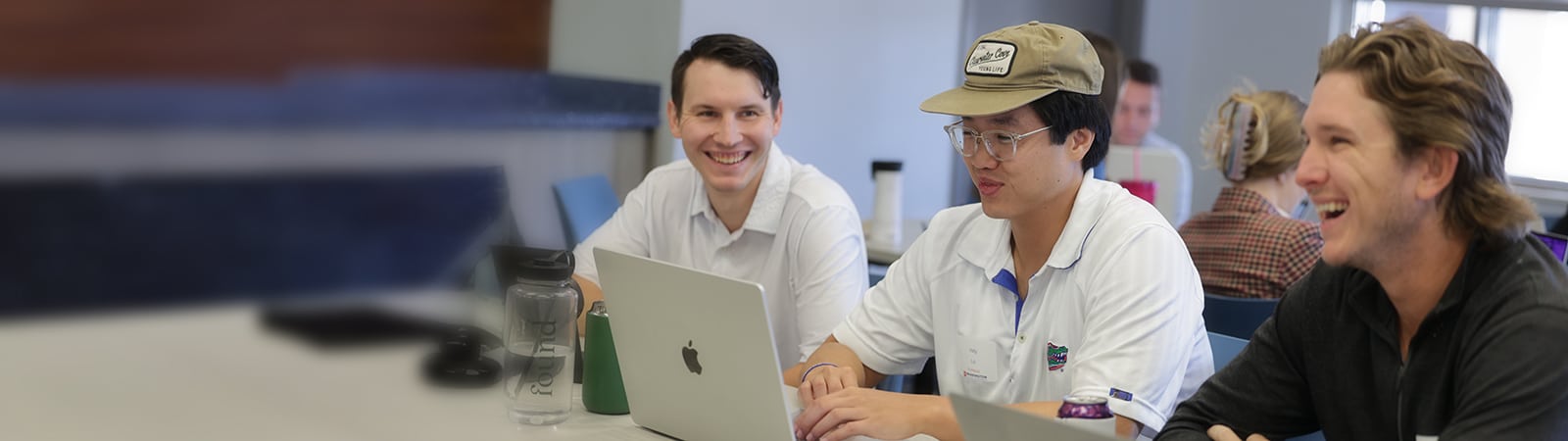 Happy students in class together.