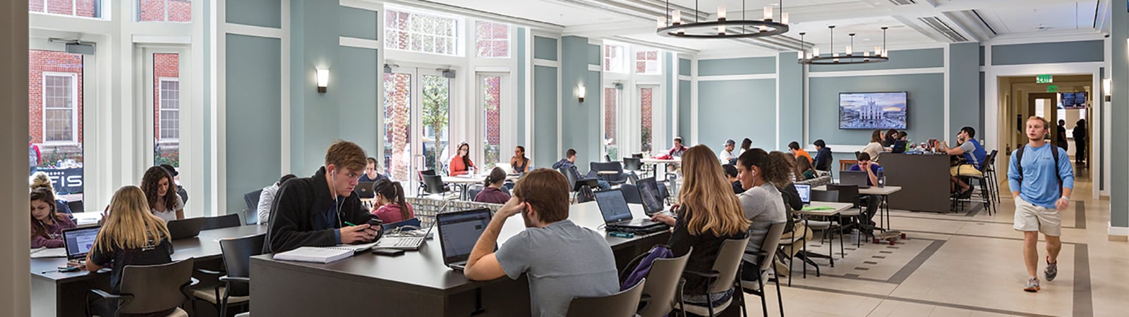 Wide shot of students studying in Heavener Hall.
