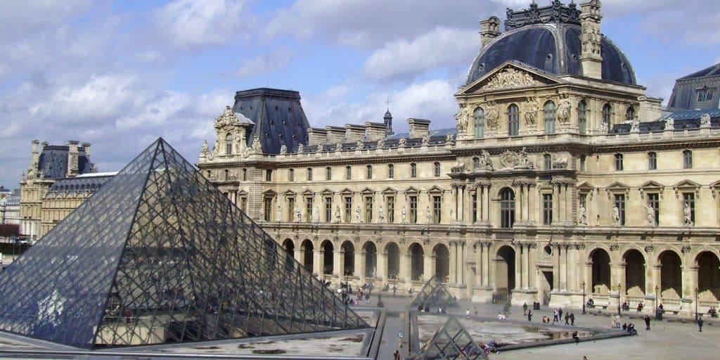 The Louvre Palace and Louvre Pyramid in Paris, France